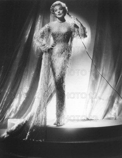 Marlene Dietrich, on Stage Wearing Beaded Illusion Gown with Cape, 1950's