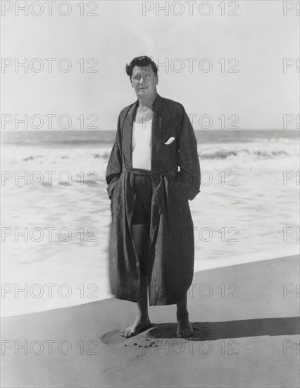 Actor George Bancroft, Portrait in Open Robe at Beach, Santa Monica, California, USA, 1930's