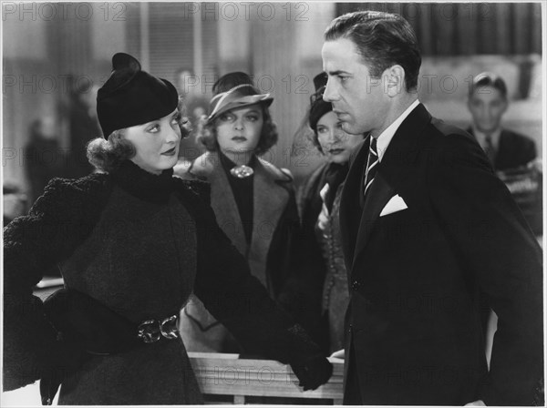 Bette Davis, Humphrey Bogart, on-set of the Film, “Marked Woman”, 1937
