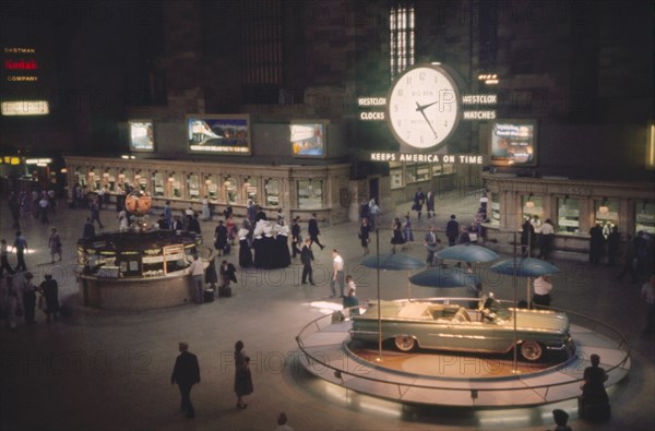Grand Central Terminal, Main Concourse with Oldsmobile Convertible on Display, New York City, New York, USA, July 1961