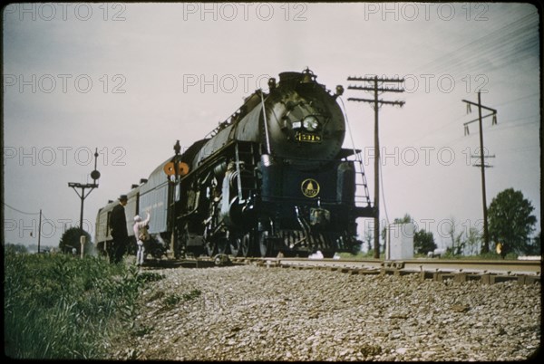 Man with Young Boy Waving to B&O Railroad Steam Locomotive Train, 1960's