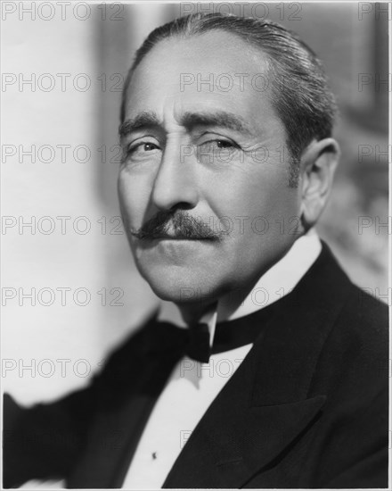 Adolphe Menjou, Head and Shoulders Publicity Portrait for the Film, "Café Metropole", 20th Century Fox, 1937