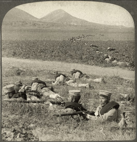 Advancing across an open field-Japan's sturdy soldiers at Port Arthur, Single Image of Stereo Card, Underwood & Underwood, 1905