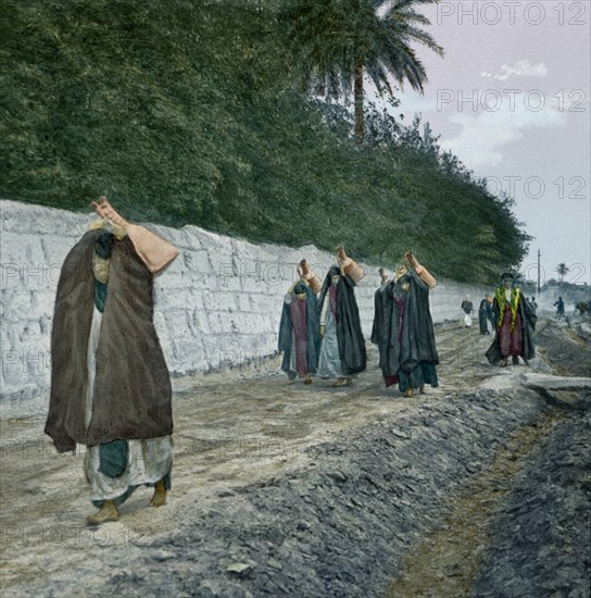 Arab Water Carriers, Hand-Colored Magic Lantern Slide, Newton & Company, 1920