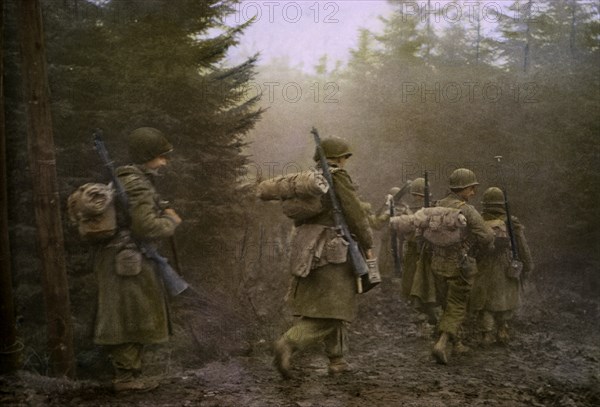 Members of Airborne Division Moving Through Forest, Ardennes-Alsace Campaign, Battle of the Bulge,