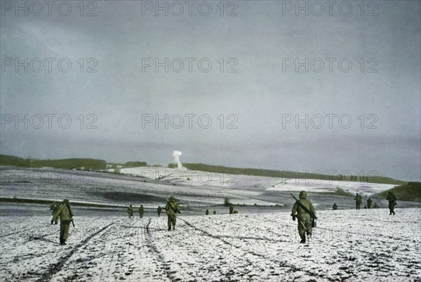 Infantrymen Advance, Bastogne, Belgium, Ardennes-Alsace Campaign, Battle of the Bulge, December 1944