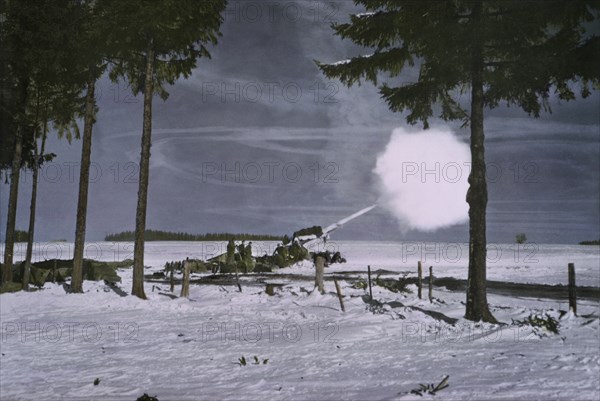 155-mm Gun M1A1 with Barrel Camouflaged with White Cloth Firing, Ardennes-Alsace Campaign, Battle of the Bulge, 1945