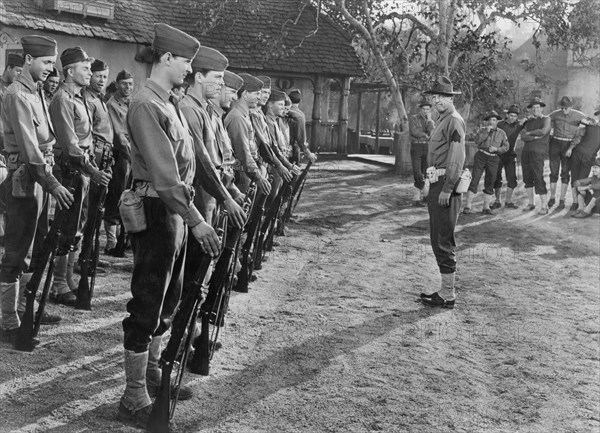 Dan Dailey (Standing alone right), on-set of the Silent Film, "What Price Glory", 20th Century Fox, 1952