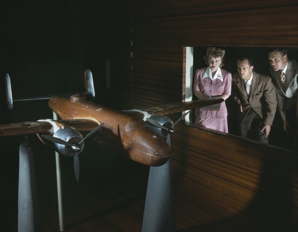 Members of Experimental Staff Observing Wind Tunnel Tests on Accurate Scale Model of B-25 Bomber, North American Aviation, Inc., Inglewood, California, USA, Alfred T Palmer for Office of War Information, October 1942