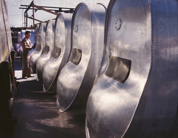 Bomb Bay Gasoline Tanks of B-25 Bombers Awaiting Assembly, North American Aviation, Inc., Inglewood, California, USA, Alfred T Palmer for Office of War Information, October 1942