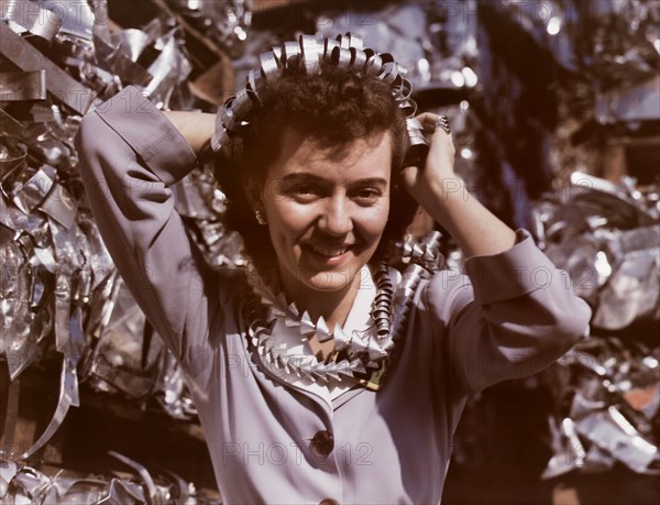 Annette del Sur Publicizing Salvage Campaign, Douglas Aircraft Company, Long Beach, California, USA, Alfred T Palmer for Office of War Information, October 1942