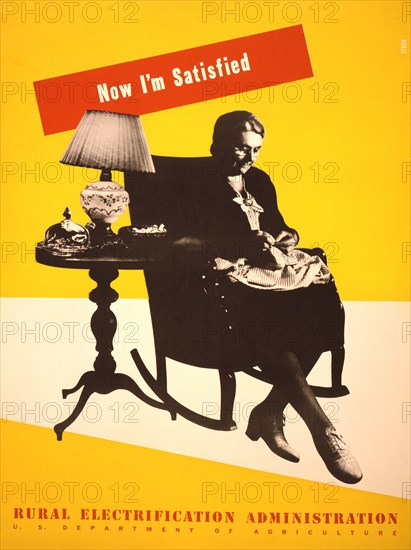 Woman Sewing While Sitting in Rocking Chair, "Now I'm Satisfied", Rural Electrification Administration, U.S. Department of Agriculture, Poster, Lester Beall, 1930's