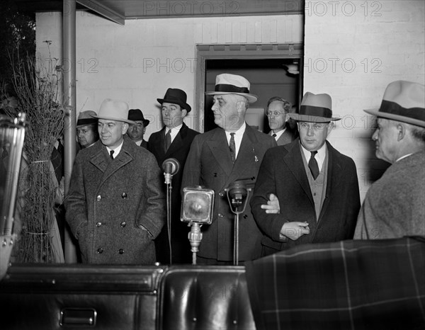 U.S. President Franklin Roosevelt with Resettlement Administration Head Rexford G. Tugwell (to Roosevelt's Right), at new Cooperative Housing Development, Greenbelt, Maryland, USA, Arthur Rothstein, Farm Security Administration, November 13, 1936