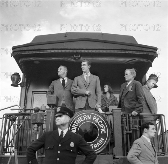 U.S. President Franklin Roosevelt Holding on to Son Franklin Delano Roosevelt, Jr., while Speaking from back of Train during Drought Inspection, Bismarck, North Dakota, USA, Arthur Rothstein, Farm Security Administration, August 1936