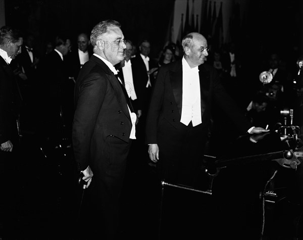 U.S. President Franklin Roosevelt & Attorney General Homer Cummings attending Department of Justice's Conference on Crime, Memorial Continental Hall, Washington DC, USA, Harris & Ewing, December 11, 1934