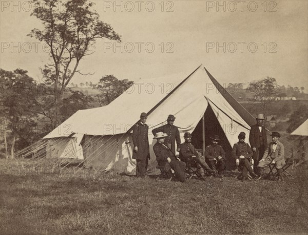 Group Portrait from Left, Captain Wright Rives, John W. Garret, an orderly, General Randolph Marcy, Lt. Col. Andrew B. Porter, Col. Thomas S. Mather, Ozias M. Hatch, Joseph C.G. Kennedy, at Army of the Potomac Headquarters, Antietam, Maryland, USA, Alexander Gardner, September 1862