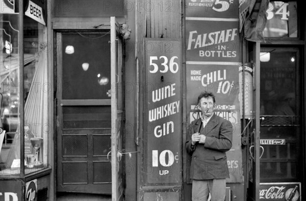 Man Smoking Cigar outside Diner, South State Street, Chicago, Illinois, USA, John Vachon, Farm Security Administration, July 1941