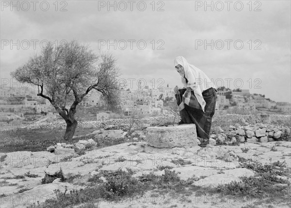 Woman Retrieving Water from Well, Bethlehem, West Bank, Matson Photo Service, March 1945
