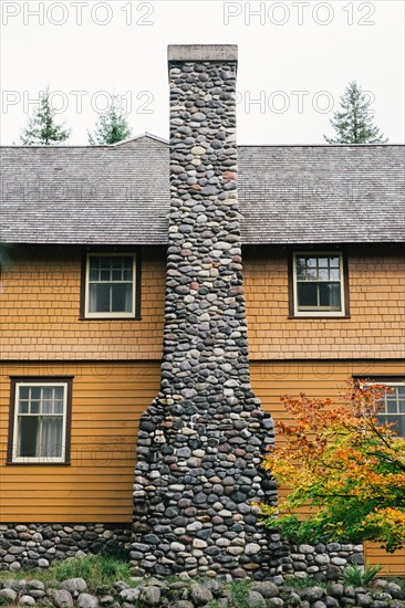 Orange House with Stone Fireplace