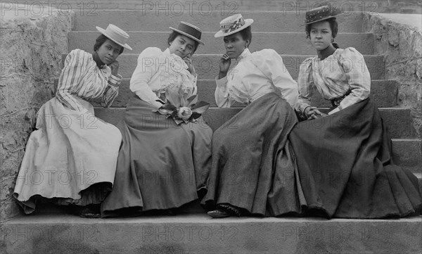 Four African American Women seated on Steps of Building at Atlanta University, Georgia, USA, 1900