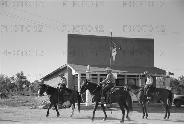 Men from Quarter Circle U Ranch in Town, Birney, Montana, USA, Arthur Rothstein, Farm Security Administration, June 1939