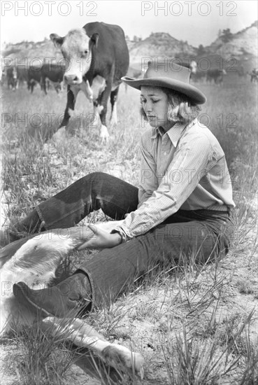 Dude Girl "Rassling" a Calf, Quarter Circle U Ranch Roundup, Montana, USA, Arthur Rothstein, Farm Security Administration, June 1939