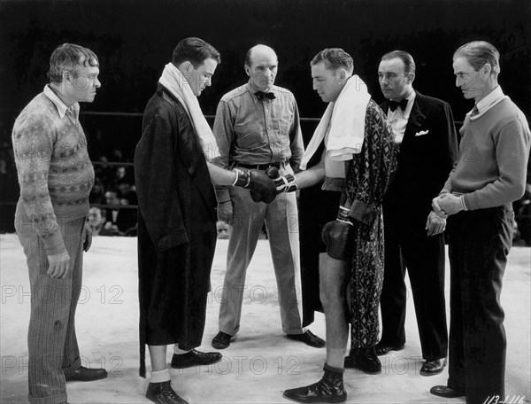 Actor Lew Ayres (second left) with his Opponent and Handlers, on-set of the Film, "Iron Man", Universal Pictures, 1931