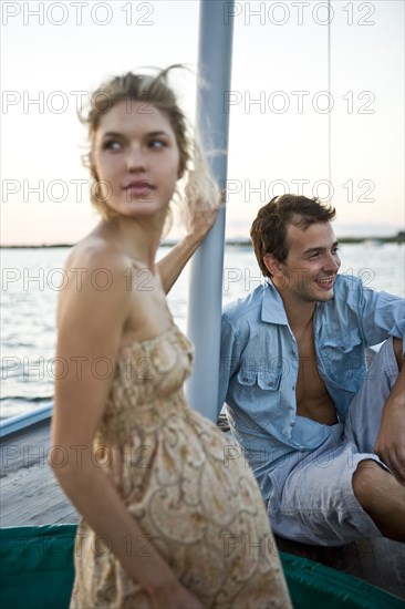 Young Couple Relaxing on Boat