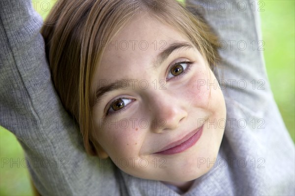 Smiling Girl With Arms Up