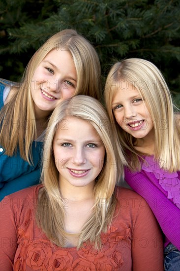 Three Smiling Blonde Girls