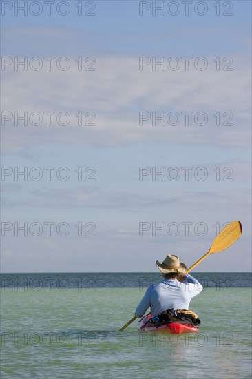 Man Kayaking on Ocean, Rear View, Florida Keys, USA