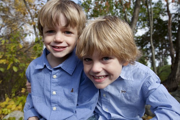 Two Smiling Boys in Dress Shirts