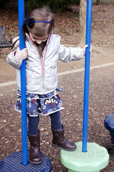 Girl Playing at Playground