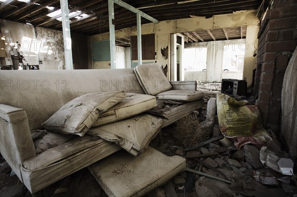 Dirty Old Couch in an Abandoned House