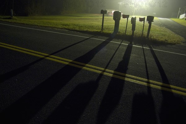 Mailboxes Casting Long Shadows