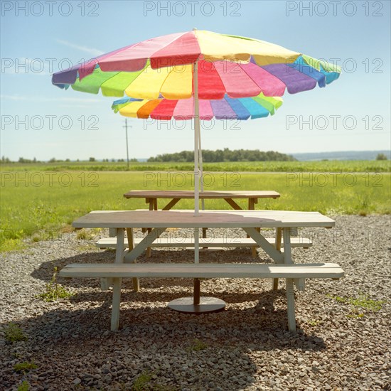 Picnic Tables With Colorful Umbrellas