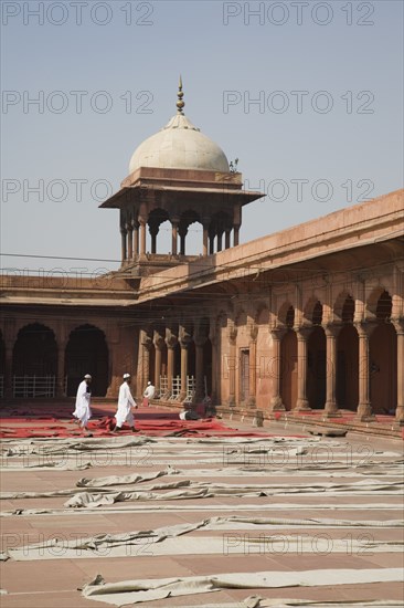 Men Walking by Jama Masjid, New Delhi, India