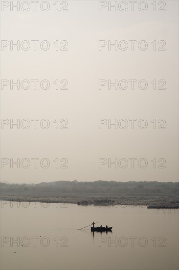 One Boat in Ganges River at Dawn