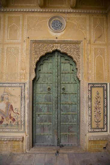 Old Green Door and Decorative Doorway