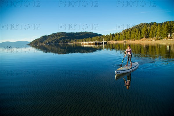 Young Girl on Paddle Board, Lake Tahoe, Nevada, USA