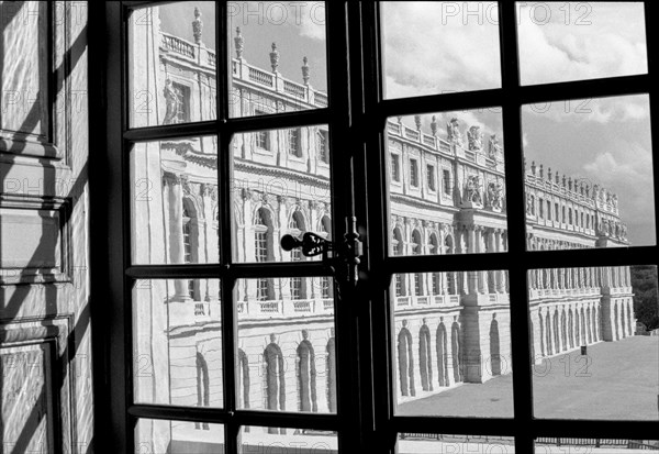 Side View of Versaille Palace through Window in Hall of Mirrors, France