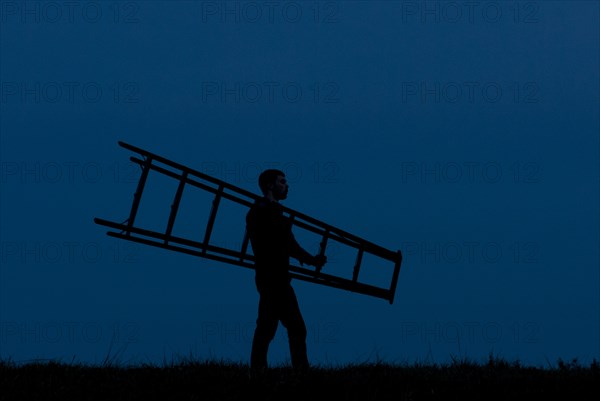 Man Carrying Ladder, Silhouette