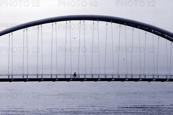 Bicyclist on Bridge