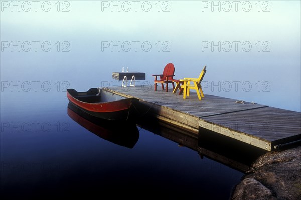 Rowboat Tied to Dock