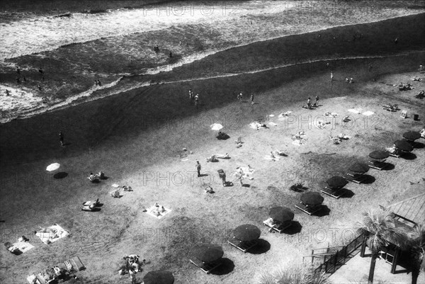 Group of People on Sandy Beach, High Angle View