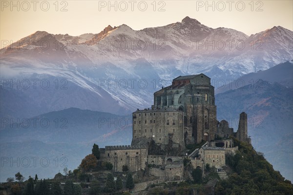 Sacra di San Michele at Sunset with Alps in Background, Italy