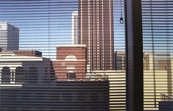 Atlanta Skyline Through Window Blinds