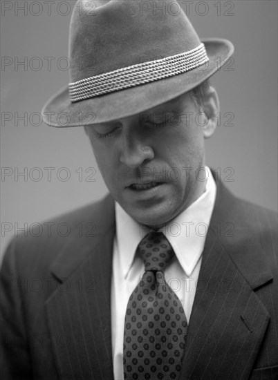 Man in Suit and Hat