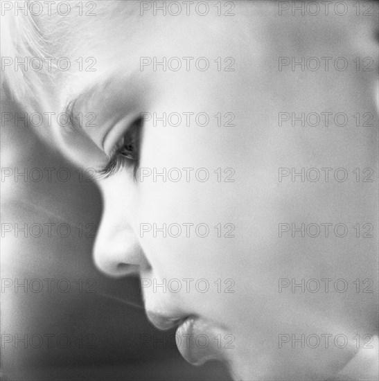 Young Boy Looking Down, Close-Up Profile