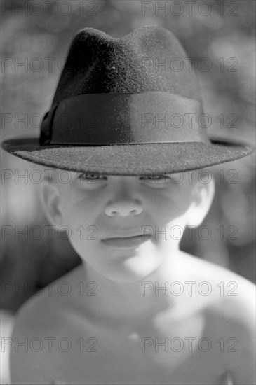 Young Boy Wearing Fedora Hat, Portrait